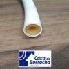 Tubo branco com interior oco sobre superfície de madeira.