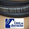 Duas correias Goodyear HCC2148 HEX sobre uma superfície marrom.