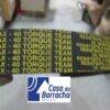 Correia com a inscrição 'AX - 40 TORQUE TEAM' em fundo preto e amarelo.