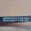 Correia preta com escrita 'Continental 3 PK 754' em destaque.