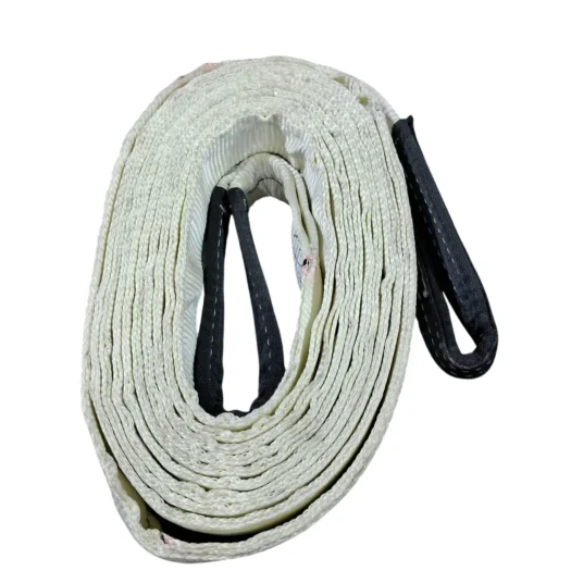 Cinta de segurança em rolo, com parte preta e branca, posicionada horizontalmente.