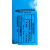 Etiqueta azul com informações técnicas sobre um produto, incluindo medidas e capacidades.